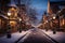 snowy evening street decorated with christmas decorations. winter holidays in the town