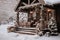 snowy front porch decorated to Christmas holidays. winter getaway cottage. travel destination