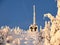 Snowy frosted trees and cable car.