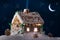 Snowy gingerbread cottage with stars and moon