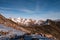 Snowy Greater Caucasus ridge. Sunny day. Before suset. View from 3500m