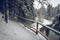 A snowy hiking trail by the river