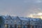 Snowy homes in Eagle Mountain against cloudy sky