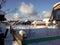 Snowy houses in suburban village. Late sunny winter days.