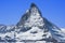 Snowy Matterhorn peak in sunny day with blue sky , Switzerland