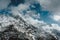 Snowy Mountain Himalayas peaks landscape of Moon Peak, Dhauladhar Range cloudy sky