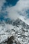 Snowy Mountain Himalayas peaks landscape of Moon Peak, Indarhar pass, Dhauladhar Range cloudy sky