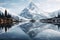 snowy mountain peak reflecting in a transparent lake