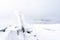 Snowy mountain peaks in Rondane national park in Norway. Snowy, foggy and frozen landscape during winter.