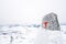 Snowy mountain peaks in Rondane national park in Norway. Snowy, foggy and frozen landscape during winter.