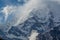 Snowy mountain range surrounded by clouds at Mardi Himal trek