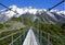 Snowy mountain view during a hike from a suspension bridge