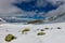 Snowy mountains aero photo drone, clouds approaching peaks and valley