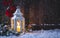 Snowy Night Scene With Glowing Lantern