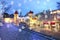 Snowy Old Town of Tallinn Red towers roofs evening city light blur panorama