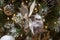 Snowy Owl and Pine Cones on A Frosty Christmas Tree