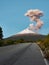 Snowy Popocatepetl volcano seen from the road