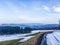 Snowy road in a countryside landscape viewing on the mountains beautiful shot in Germany hochsauerland