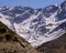 Snowy road between the mountains of Cajon del Maipo, Road to El Yeso Reservoir