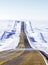 A snowy road in the plains of Eastern Colorado.