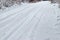 Snowy road after snowfall. Winter rural landscape