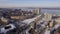 Snowy russian city in daytime, aerial view, calm landscape