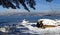 Snowy scene of Spanish Banks in Vancouver with the north shore mountains in distance