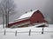 Snowy Serenity: A Home Embraced by Winter's Blanket