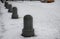 snowy squares and streets with mosaic cobblestone tiles made of granite white marble separated by stone