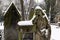 The snowy Statue from the mystery old Prague Cemetery, Czech Republic