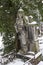 The snowy Statue from the mystery old Prague Cemetery, Czech Republic