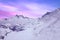 Snowy summits of mount Jungfrau in the Bernese Alps against the backdrop of sunset sky in the pastel color, Switzerland