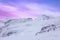 Snowy summits of mount Jungfrau in the Bernese Alps against the backdrop of sunset sky in the pastel color, Switzerland