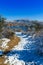 A snowy trail through the desert leading to Watson Lake