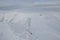 Snowy trail in the mountains with winter mountain