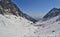 Snowy valley scenery in winter mountains