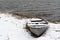 Snowy vintage rowing boat