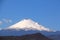 Snowy volcano Popocatepetl with blue sky in puebla, mexico VI