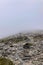 Snowy wind and fog on Maroma peak in thunderstorm day