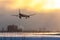 On a snowy winter evening, a jet plane lands at Sheremetyevo Airport in Moscow, Russia