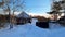 Snowy winter forest countryside . Wooden log houses Russian village covered snow. Winter Russia