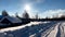 Snowy winter forest countryside . Wooden log houses Russian village covered snow. Winter Russia