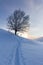 Snowy winter landscape in the alps, sunrise with halo phenomena