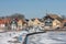 Snowy winter landscape Dutch fishing village Urk with frozen harbor