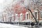 Snowy winter street scene by Washington Square Park in New York City