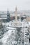 Snowy winter view of the historic Washington Monument and Mount Vernon Place in Baltimore, Maryland
