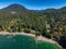 Snug Cove, Bowen Island, British Columbia, Canada. Aerial view of marina, pier, beach and resorts