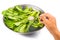 Soak vegetable in water with salt to remove pesticides residues