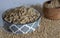 Soaked whole grain hulled barley in a ceramic bowl