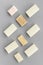 Soap bars flat lay on grey background top-down pattern